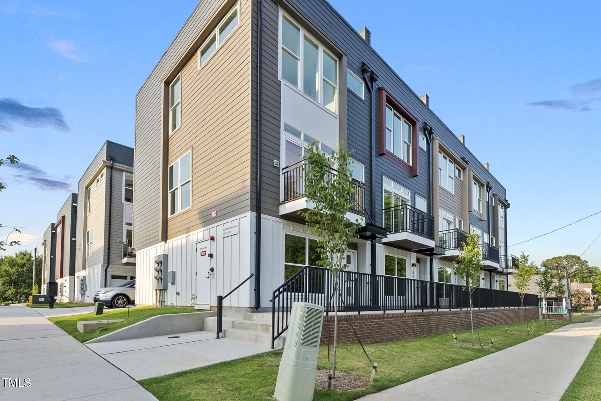 a view of a building with a yard