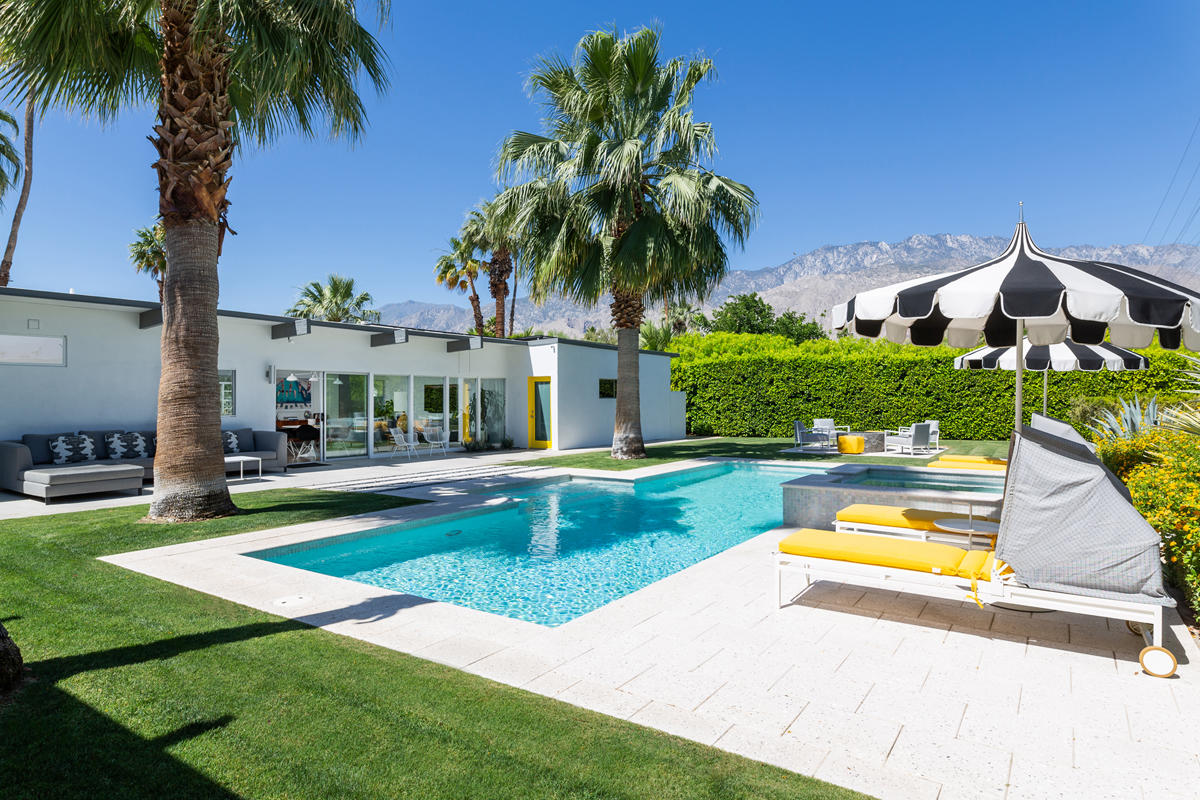 a view of a house with swimming pool