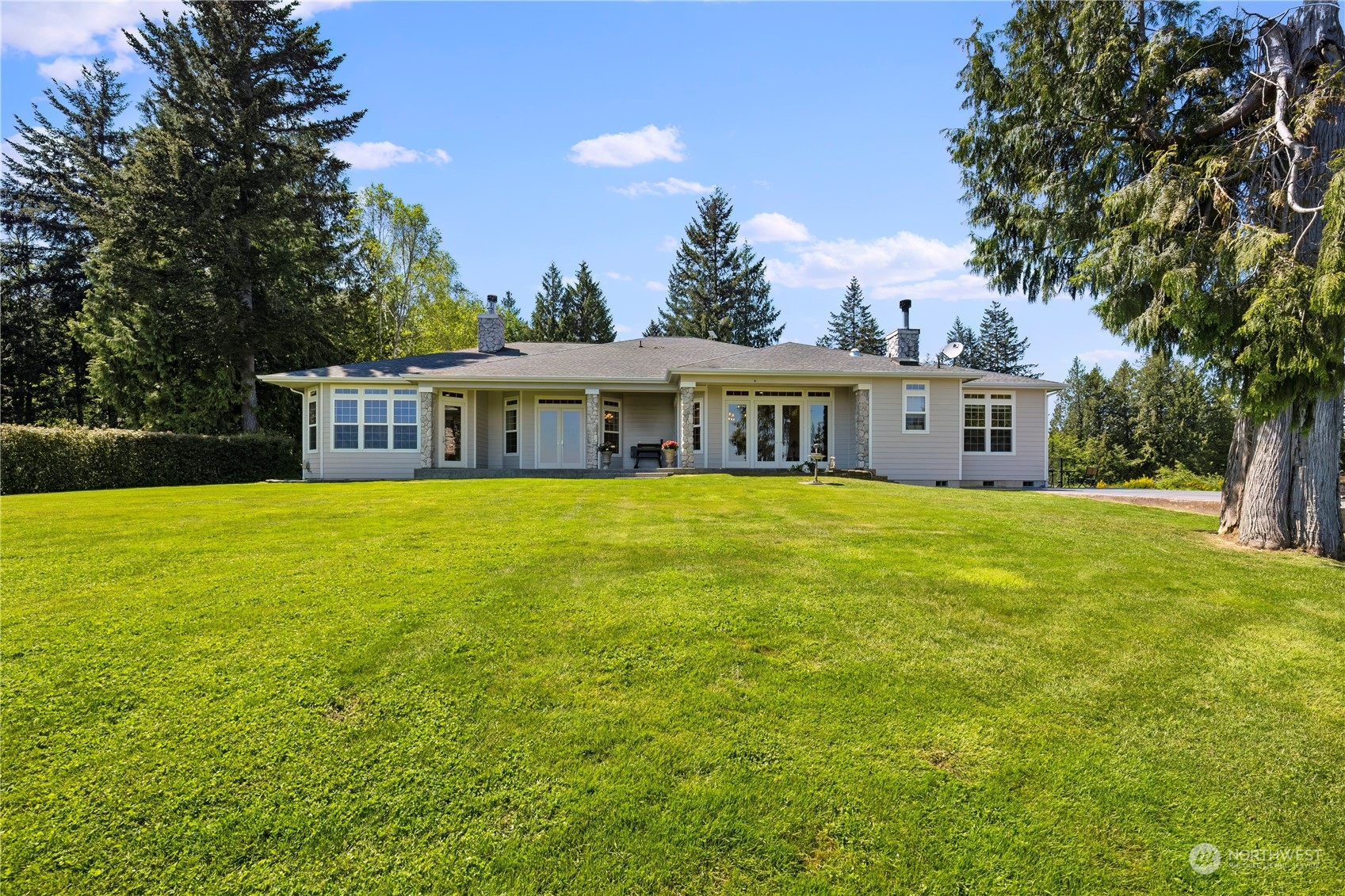 a view of a house with a big yard