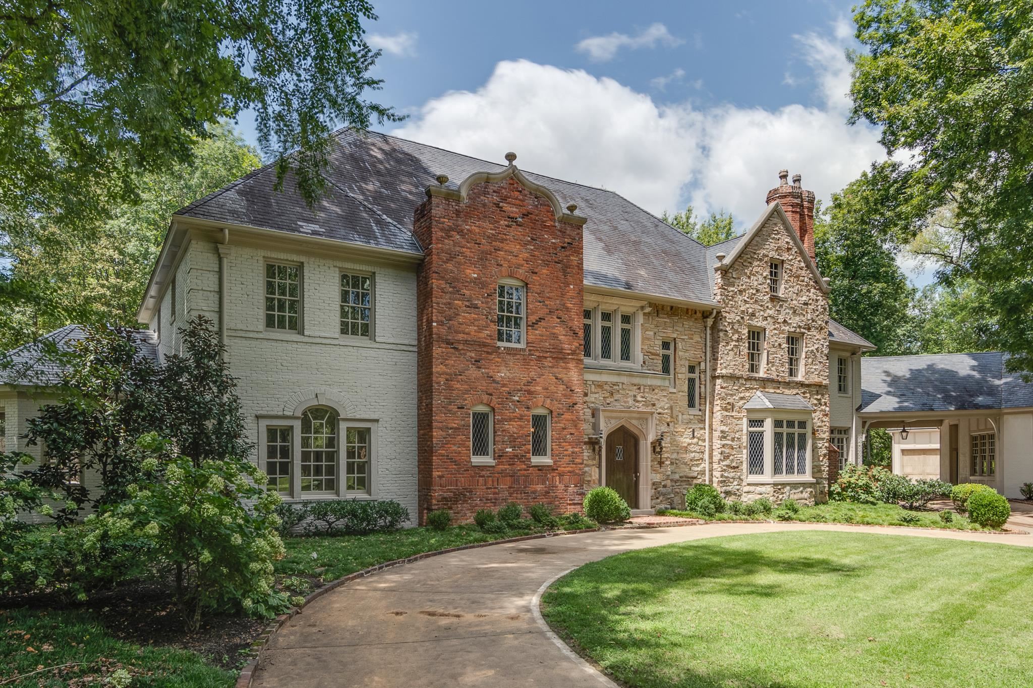 View of front of property with a front yard