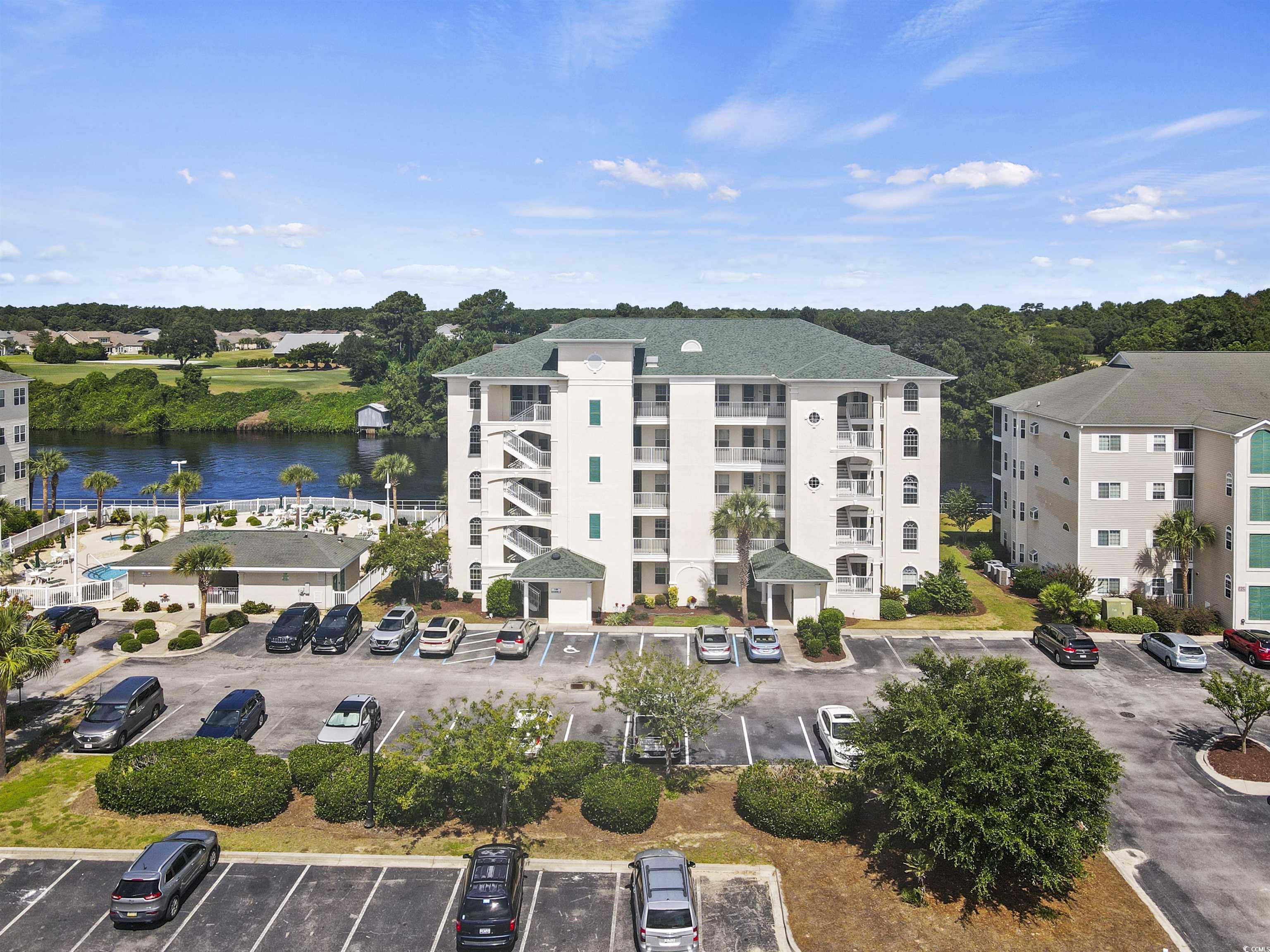 View of building exterior featuring a water view