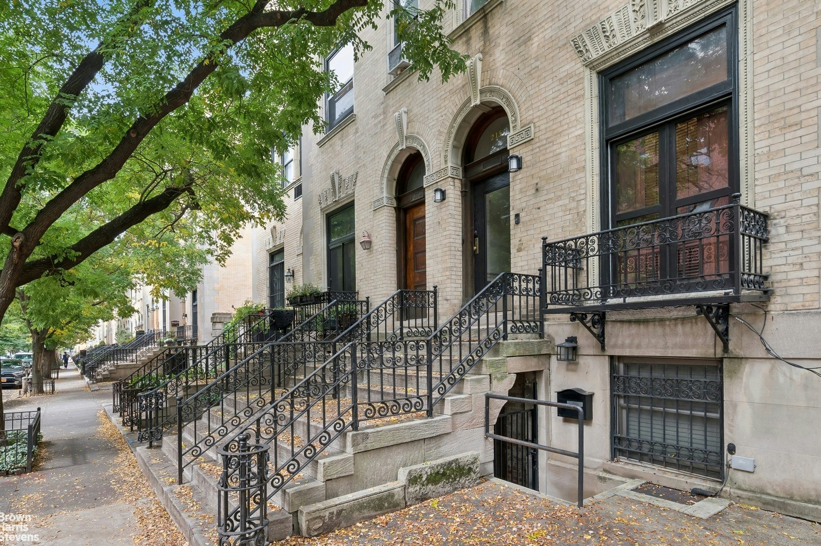 a front view of a house with parking