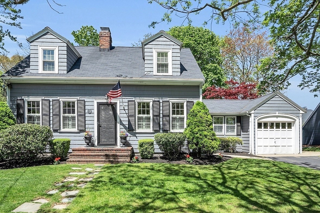 front view of a house with a yard