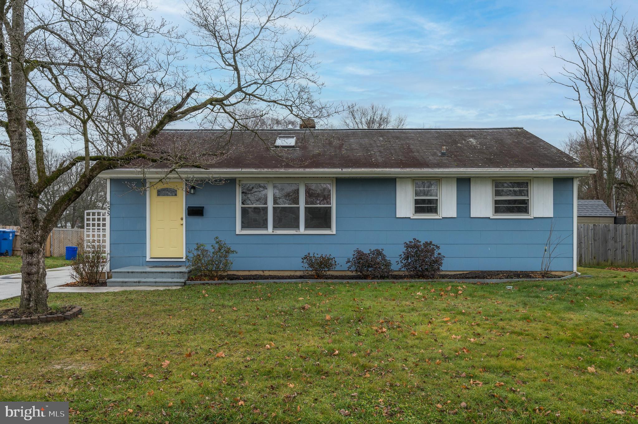 a front view of house with yard