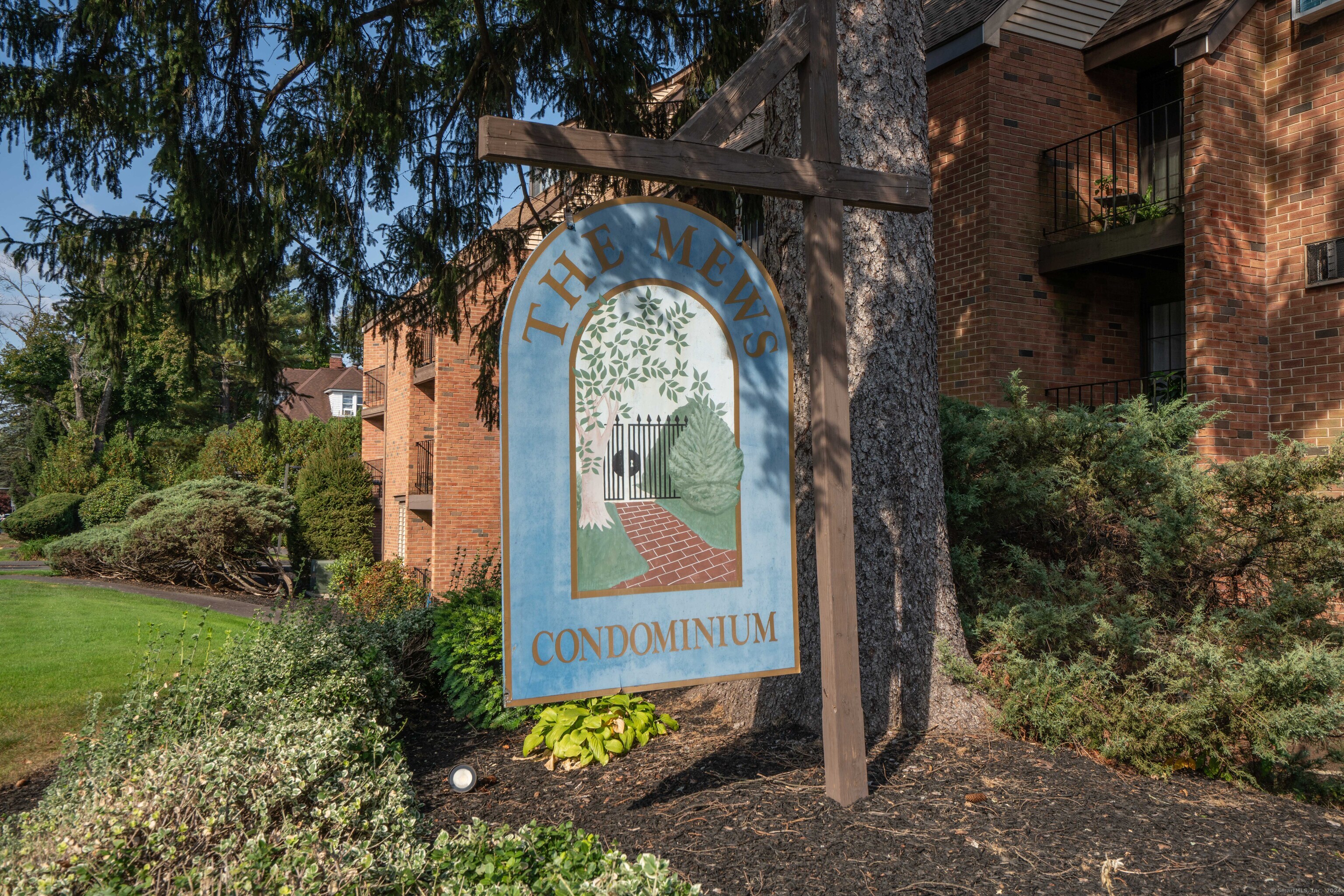 a view of a entrance gate of the house and garden