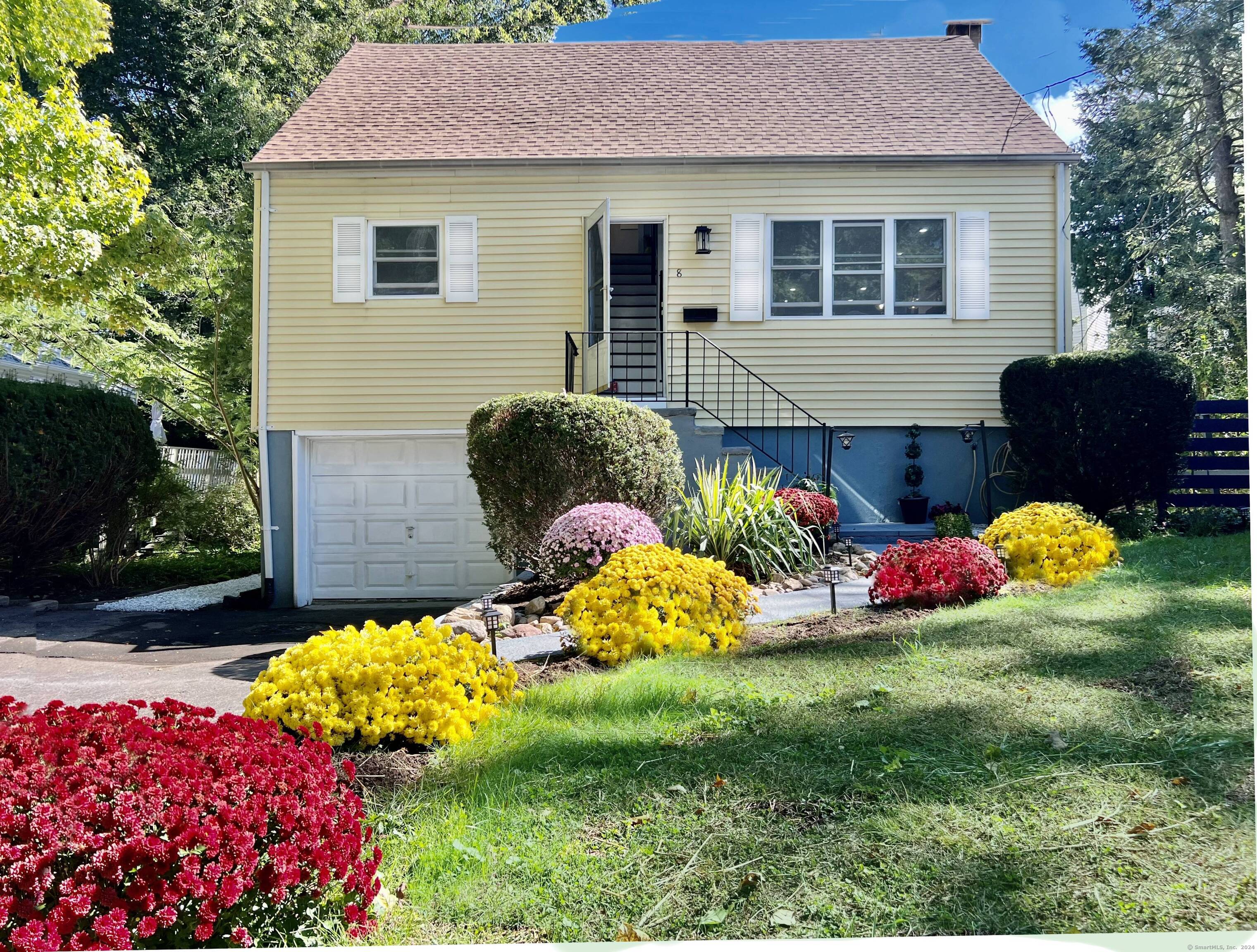 a front view of house with yard