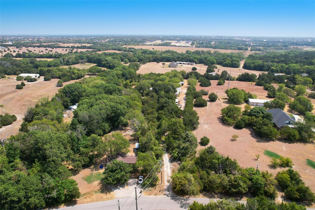 an aerial view of a city with lots of residential buildings