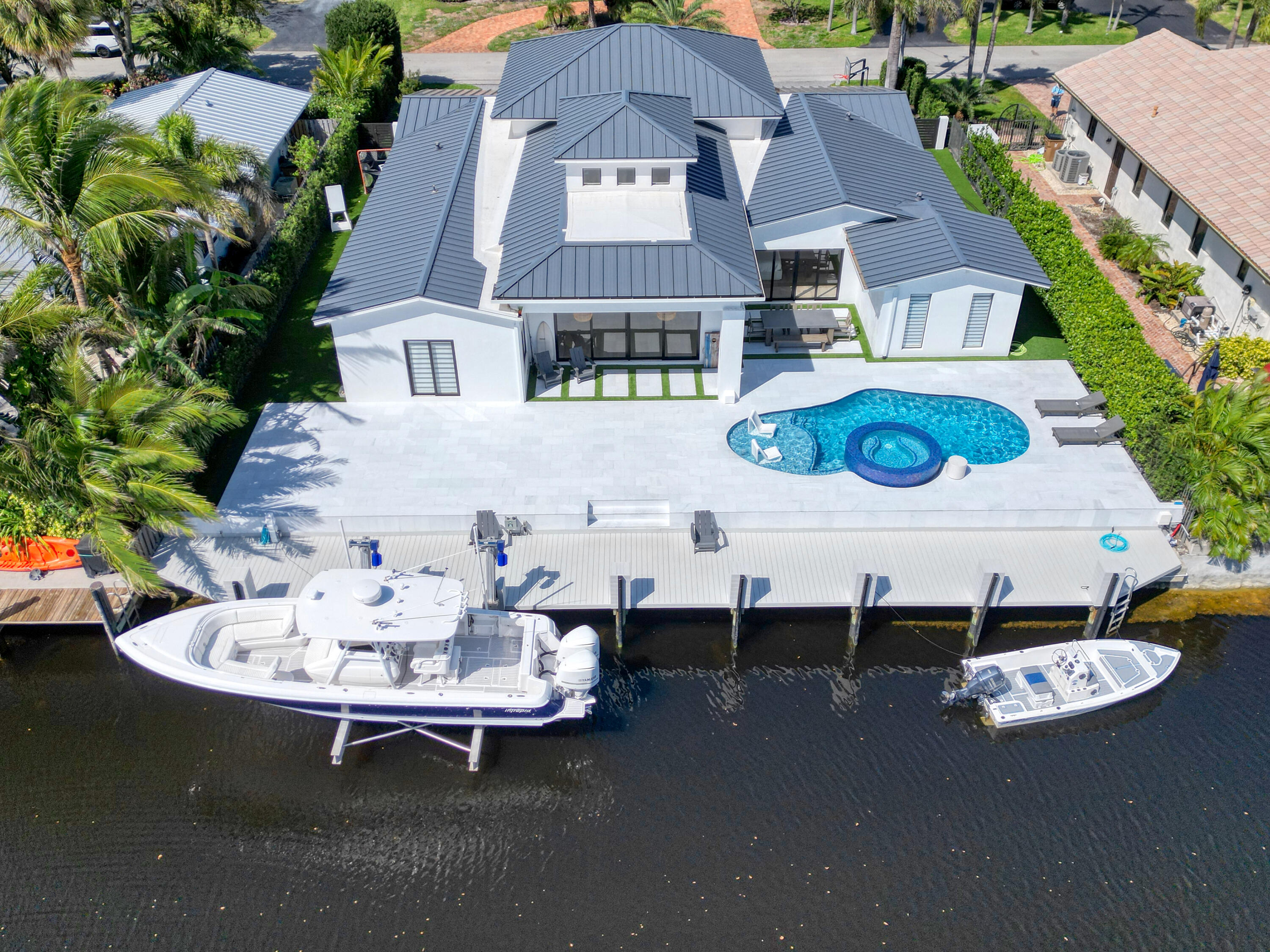 an aerial view of a house with outdoor space