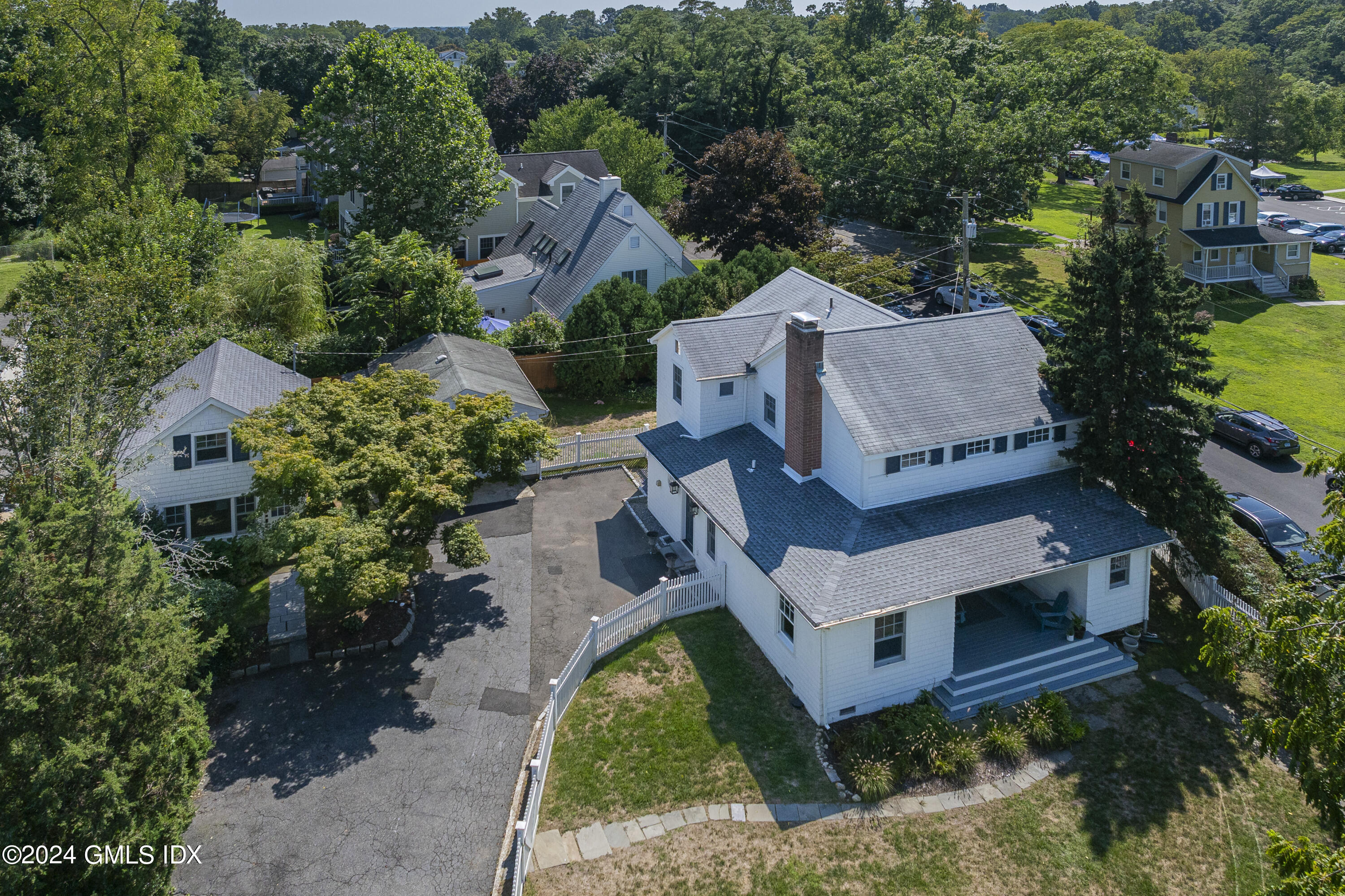 an aerial view of a house with a garden