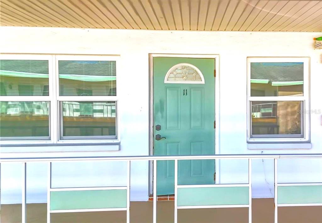 a view of a door front of a house