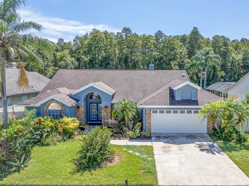 front view of a house with a yard