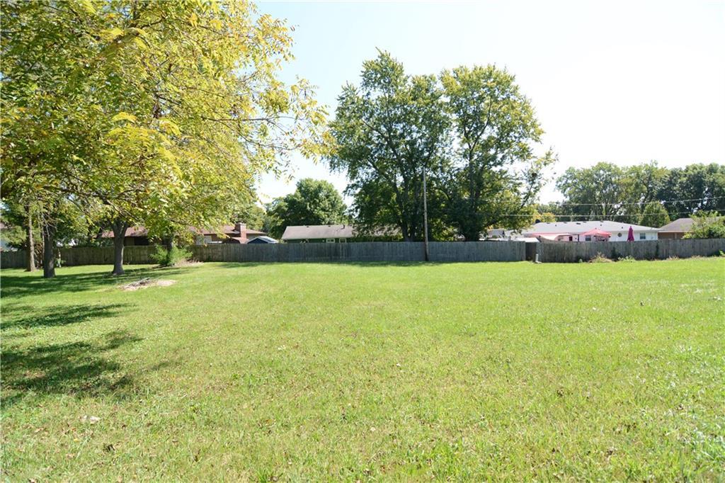 a view of garden with trees