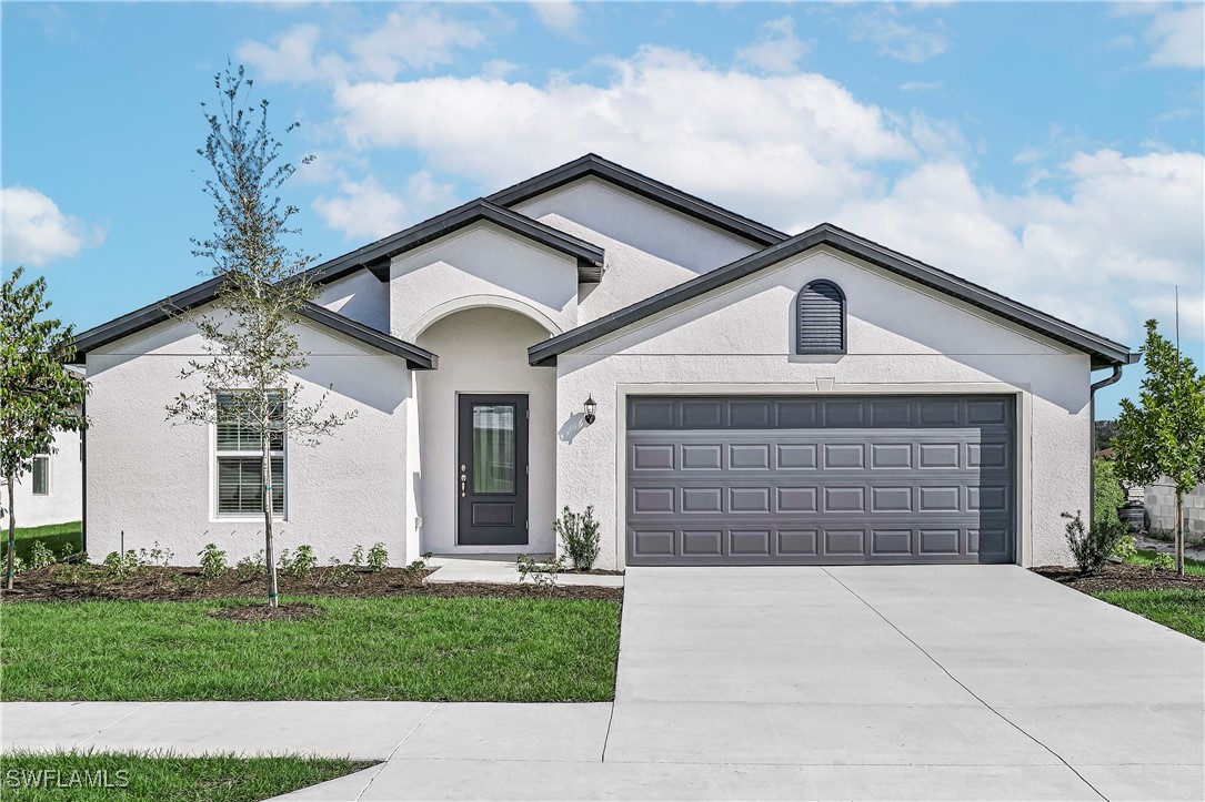 front view of a house with a yard