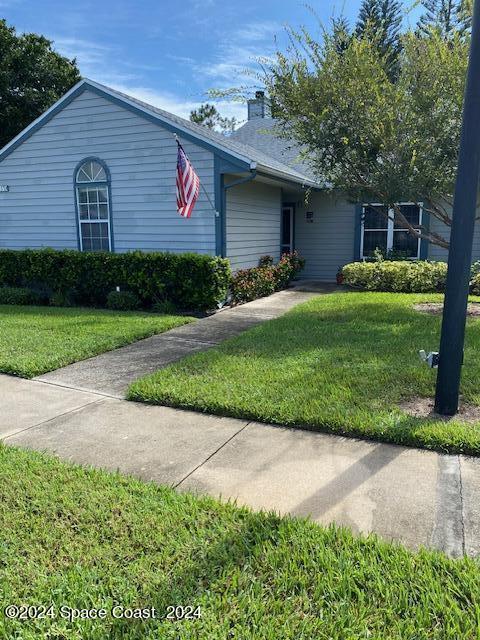 a front view of house with yard