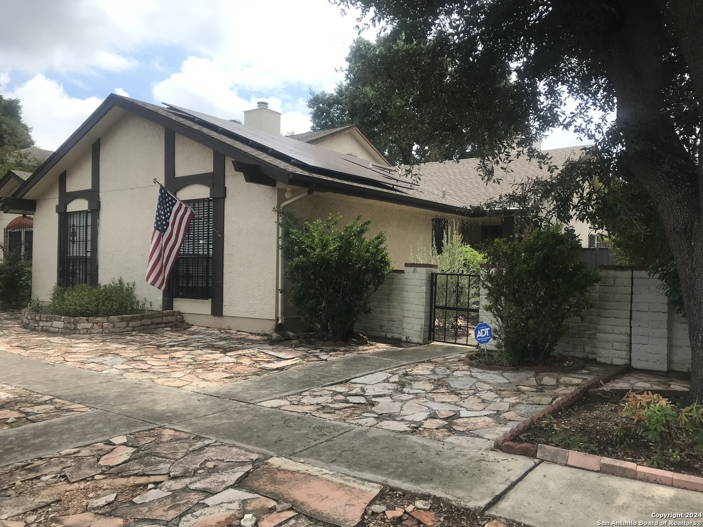 a view of a house with a patio