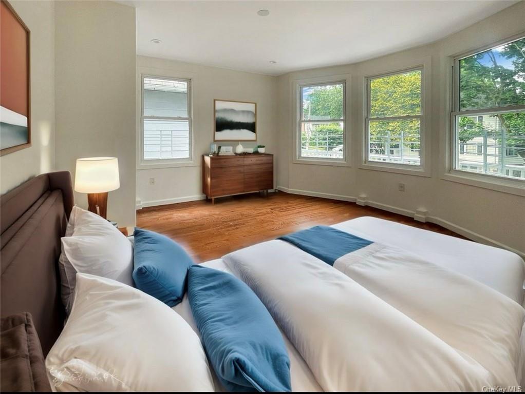 Bedroom featuring hardwood / wood-style flooring