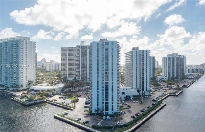 a view of a city with tall buildings