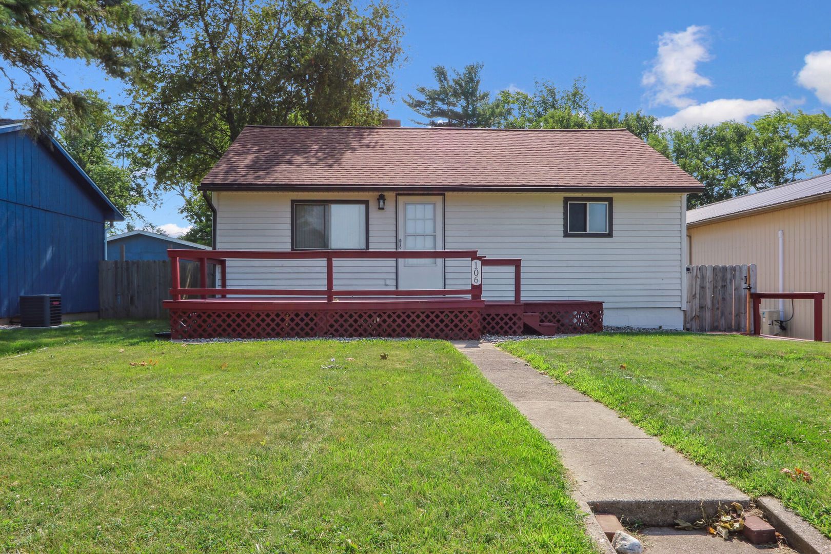 a view of house with yard