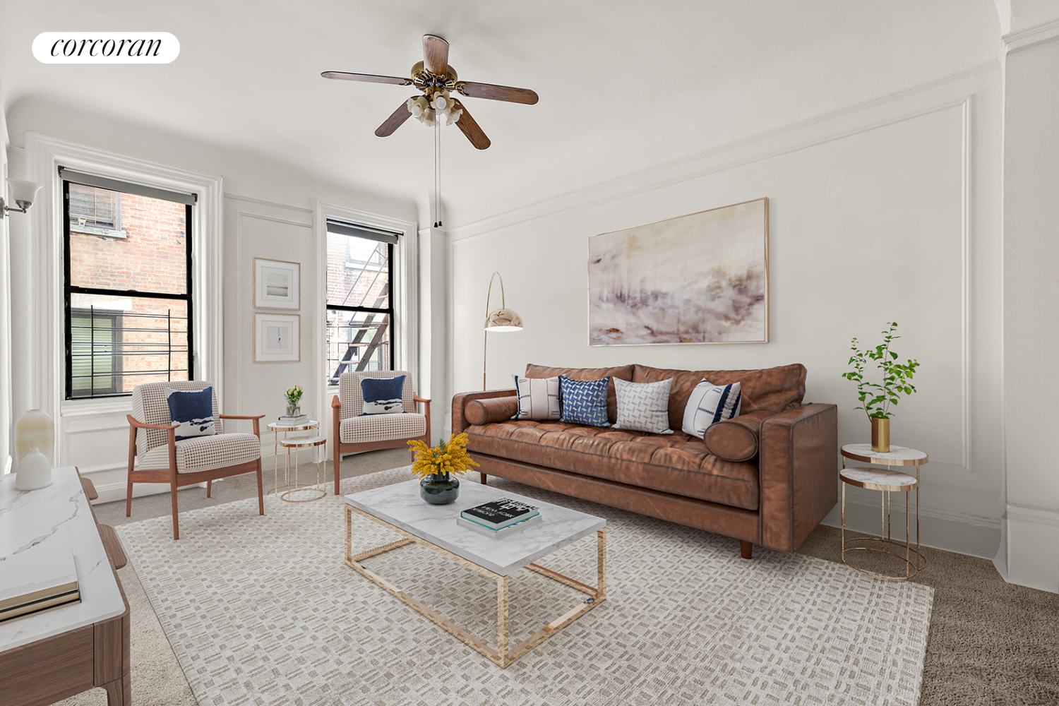 a living room with furniture a rug and a window