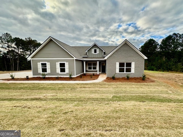 a front view of a house with a patio