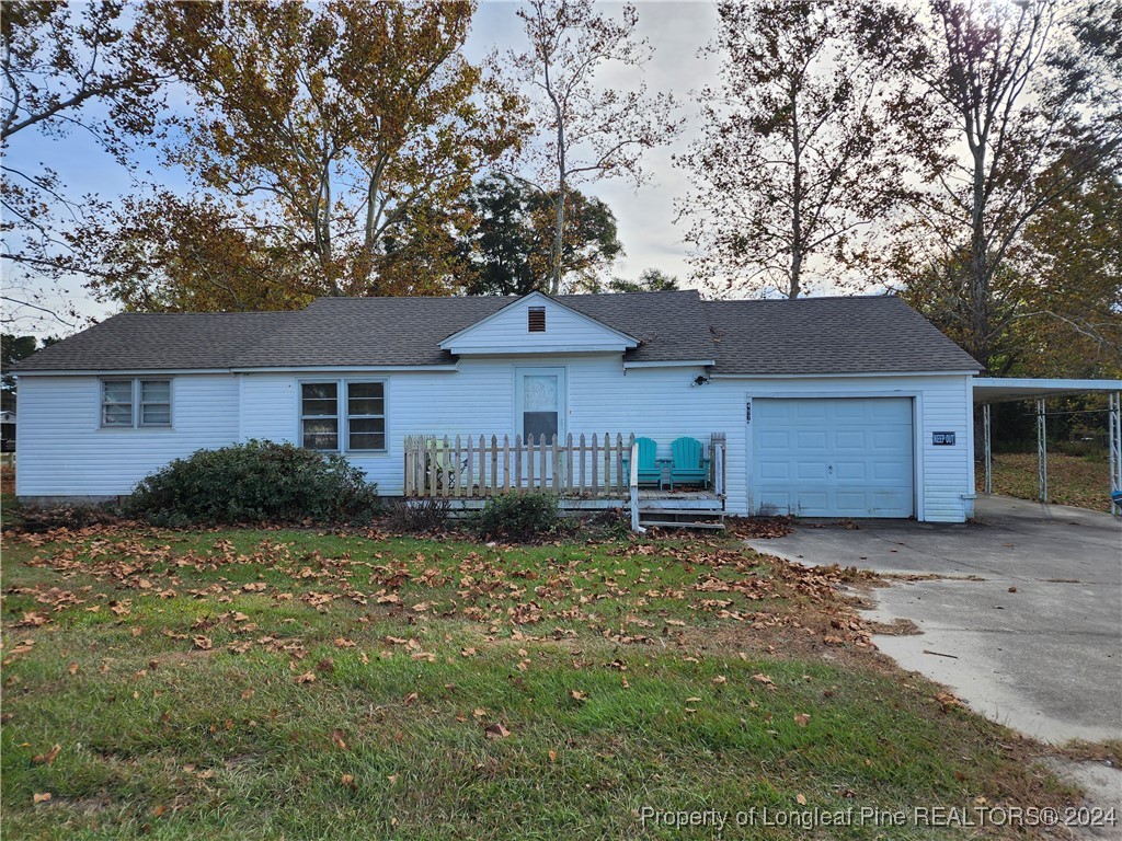 a house with a tree in front of it