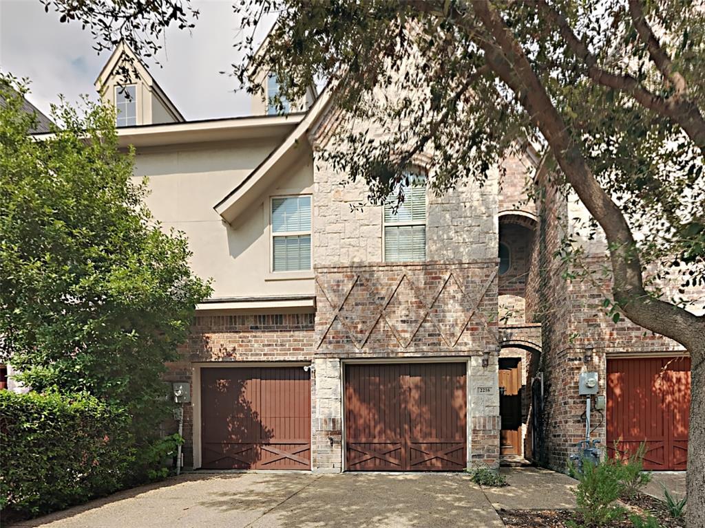 a front view of a house with yard