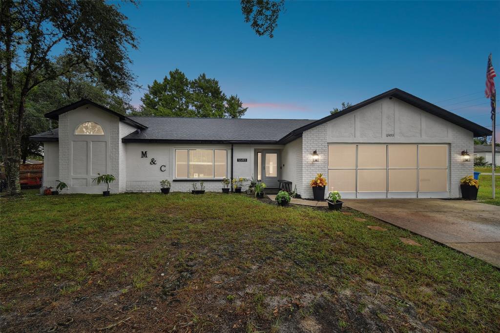 front view of a house with a yard