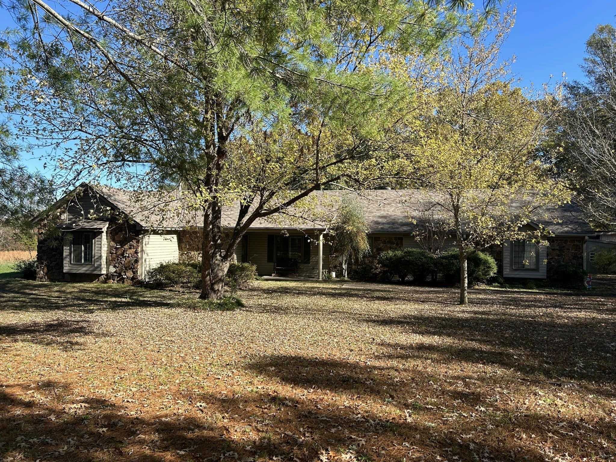 View of front of property featuring a front lawn