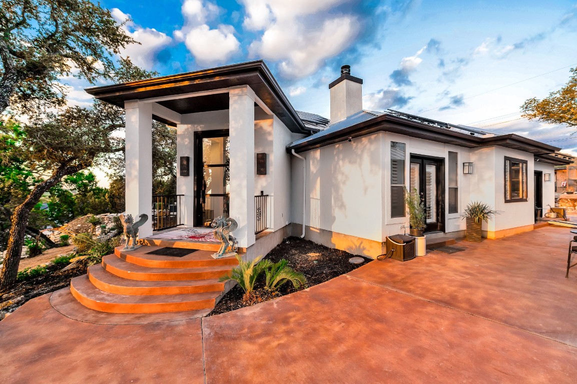 a front view of a house with yard