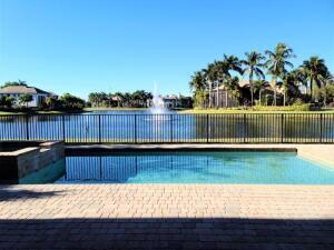 a view of swimming pool having outdoor seating