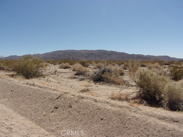 a view of mountain view with mountains in the background