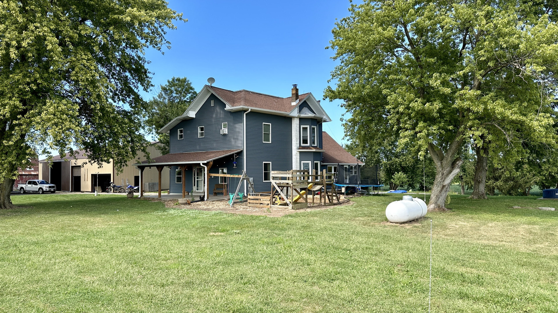 a front view of a house with patio