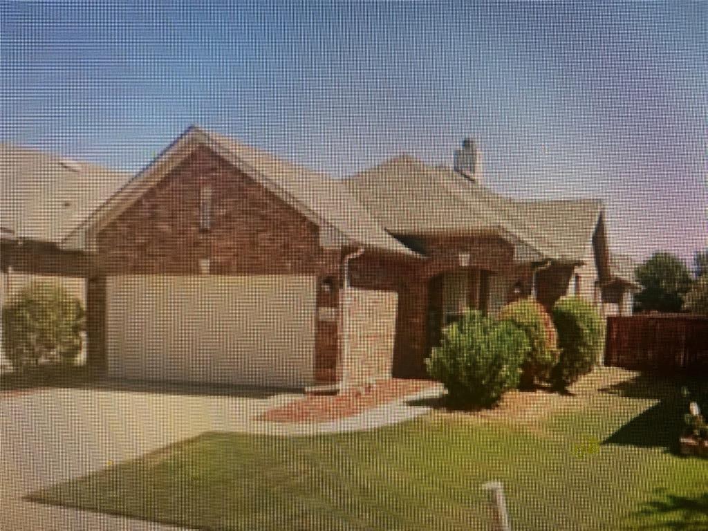 a front view of house with yard