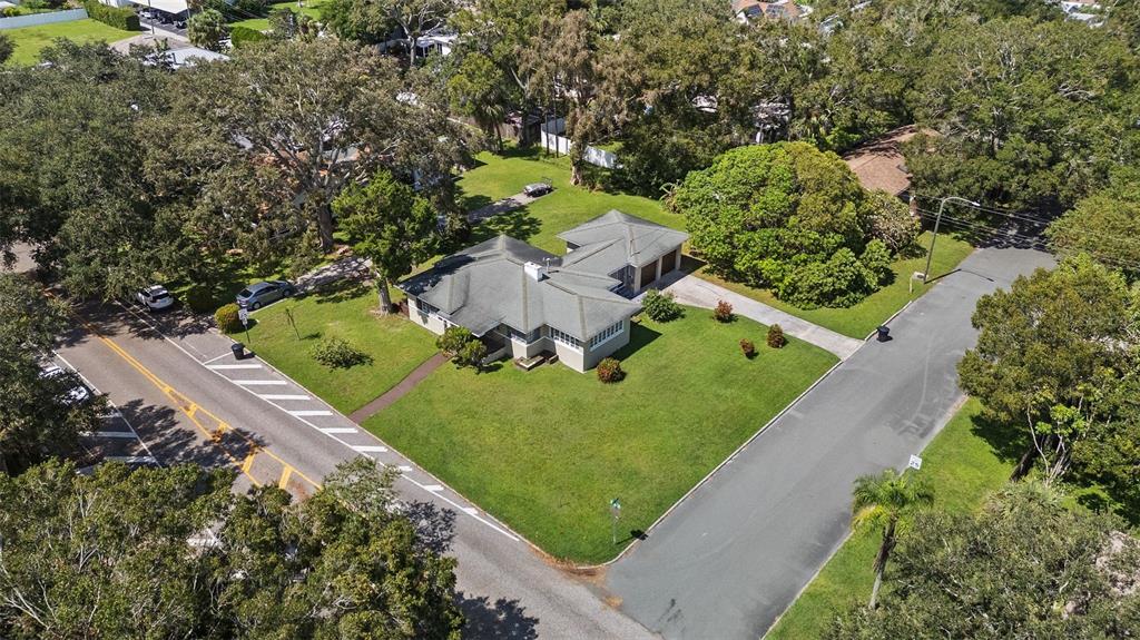 an aerial view of a house with a garden