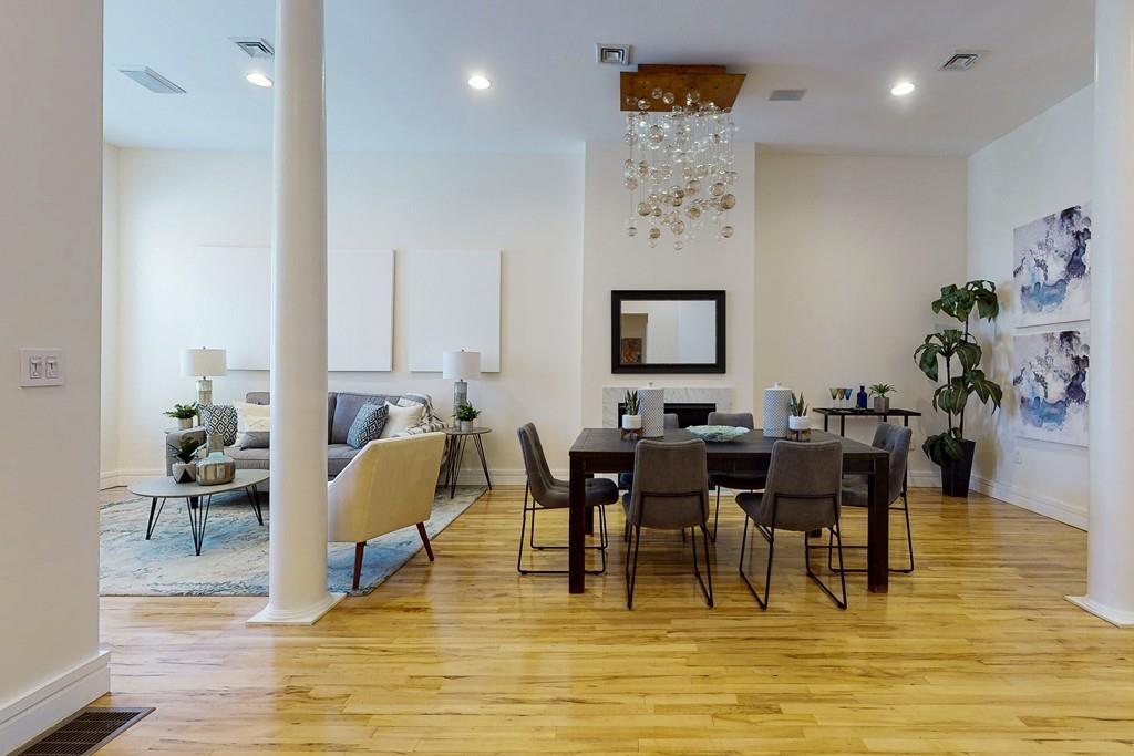 a view of a dining room with furniture