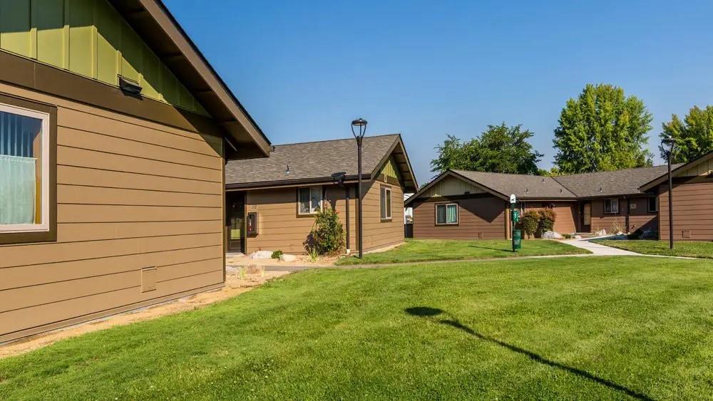 a view of a house with a yard