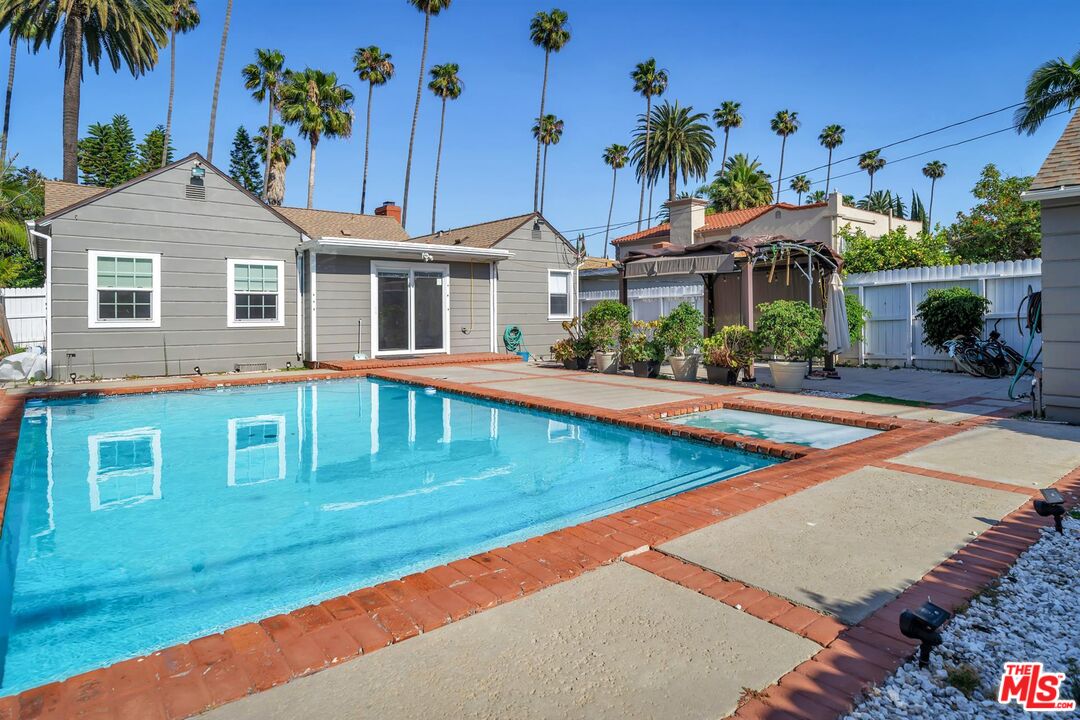 a view of a house with a swimming pool