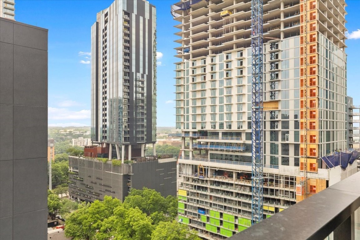 a view of a tall building from a window