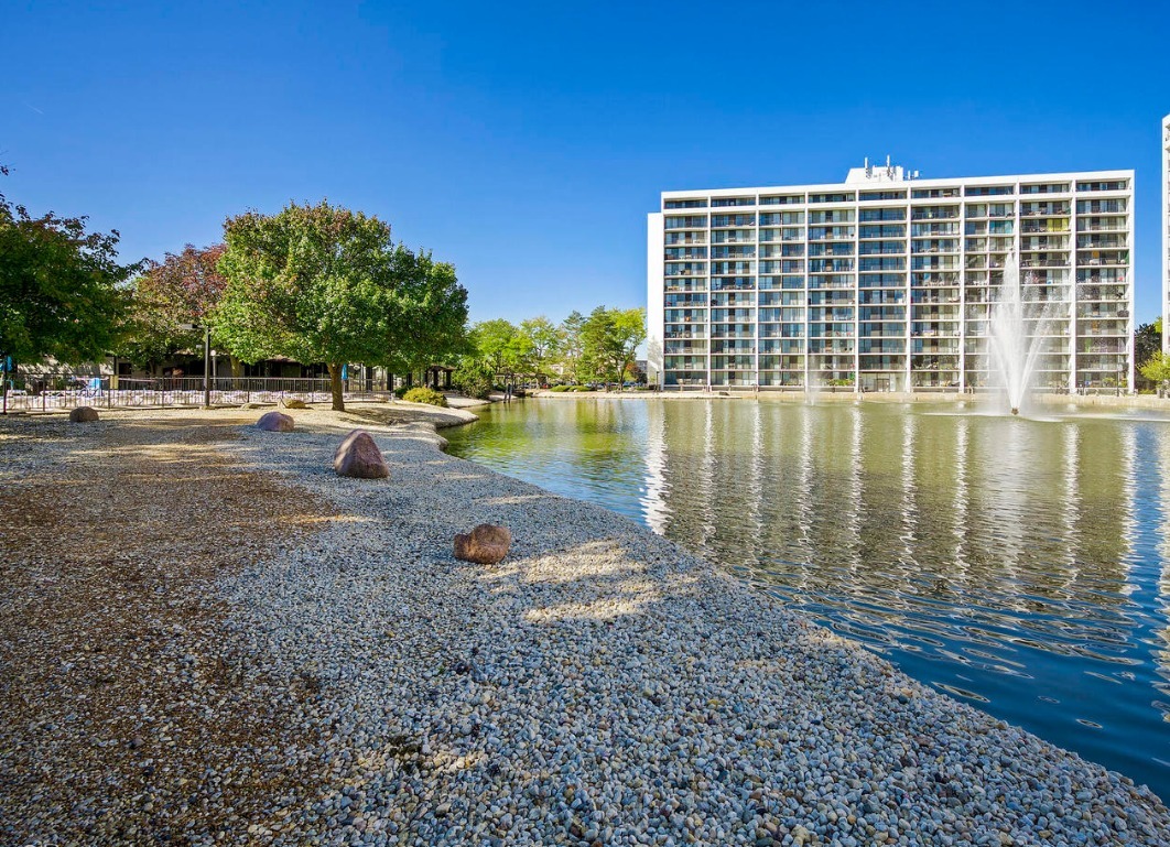 a view of a lake with a big yard