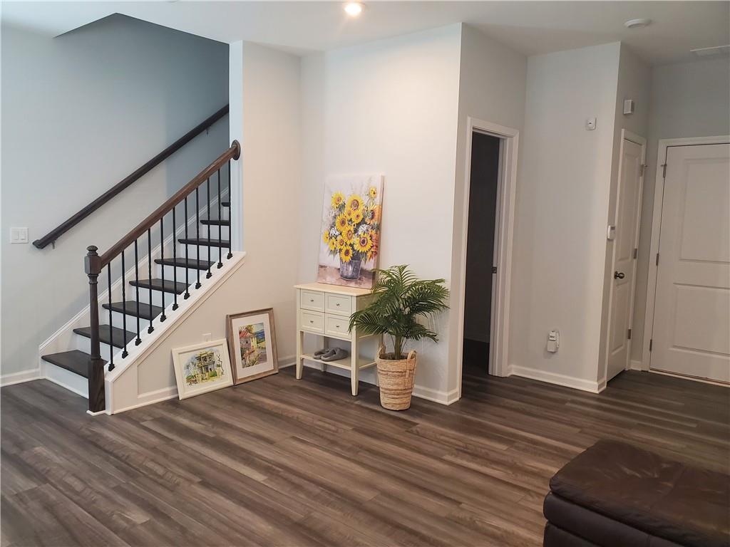 a view of entryway with wooden floor