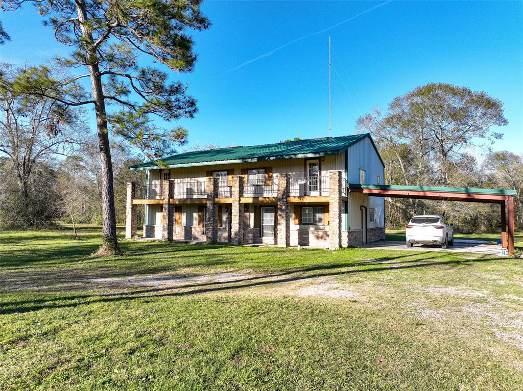 3000 sqft home with a carport on 14 acres!