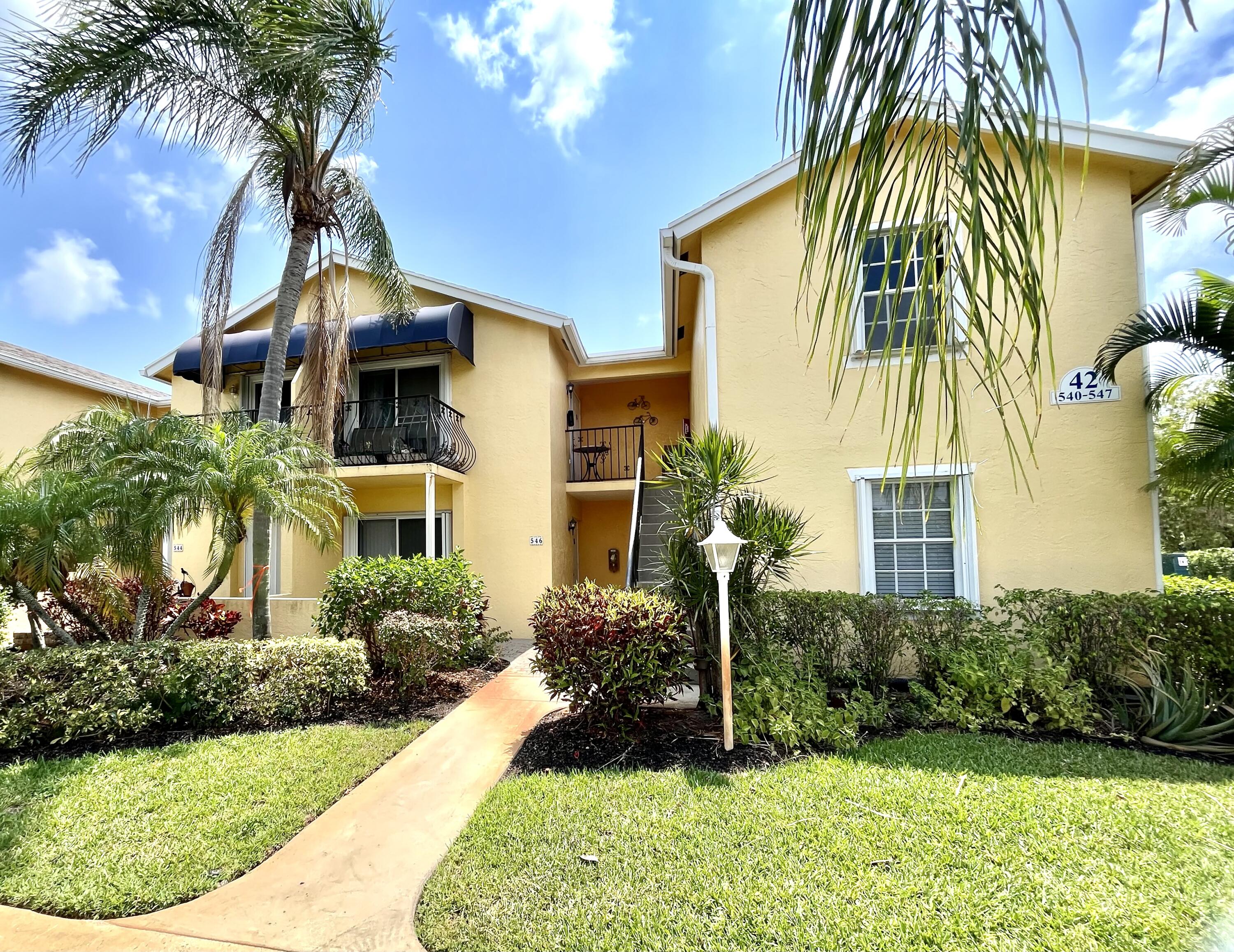 a front view of a house having yard