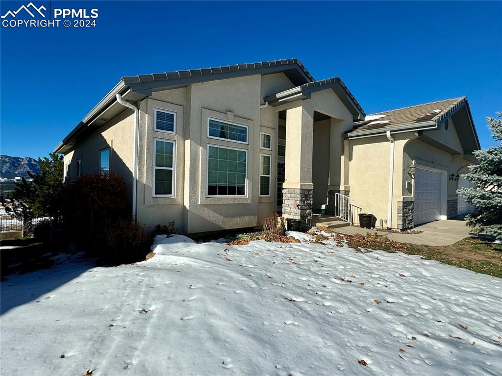 View of front of house with a garage