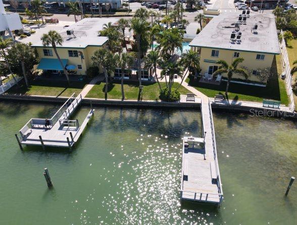 an aerial view of a house with swimming pool