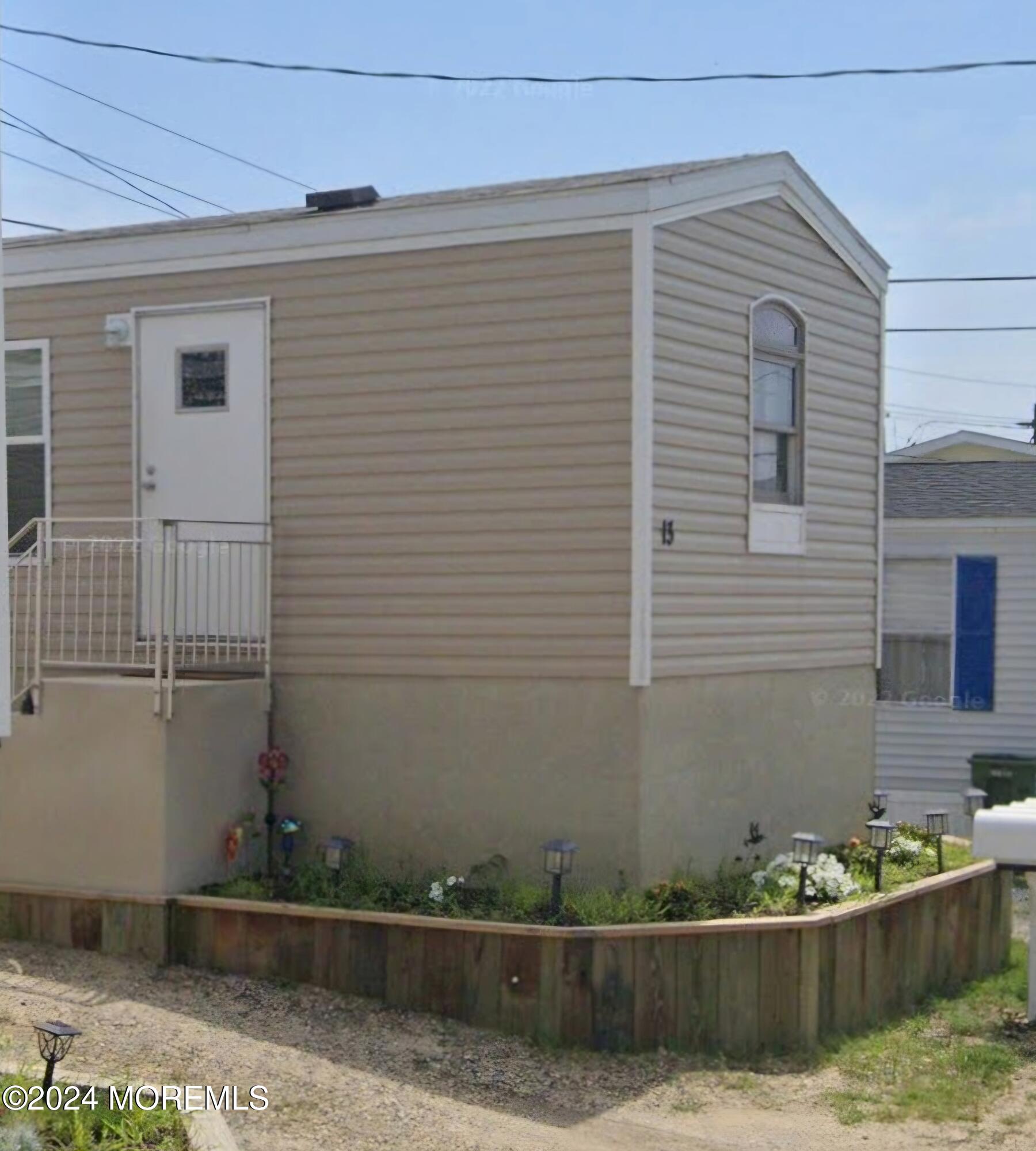 a view of balcony and yard