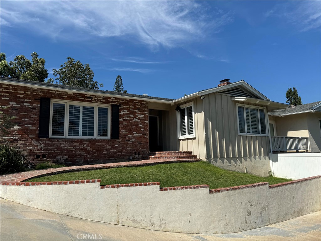 front view of a house with a pathway