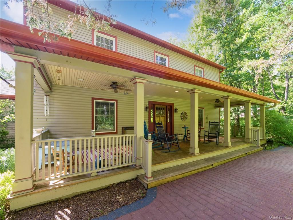 a front view of a house with a porch