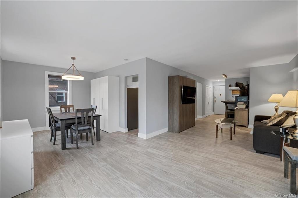 Dining space featuring light hardwood / wood-style flooring