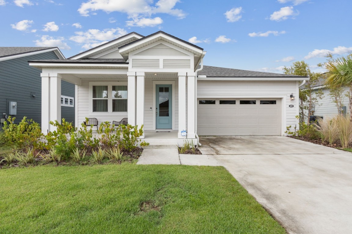 front view of a house with a yard