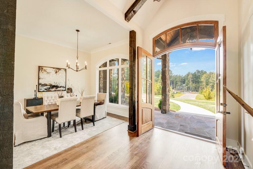 a view of living room with furniture and floor to ceiling window